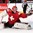 TORONTO, CANADA - DECEMBER 30: Switzerland's Gauthier Descloux #29 reaches out in attempt to make a glove save during preliminary round action against Denmark at the 2015 IIHF World Junior Championship. (Photo by Andre Ringuette/HHOF-IIHF Images)

